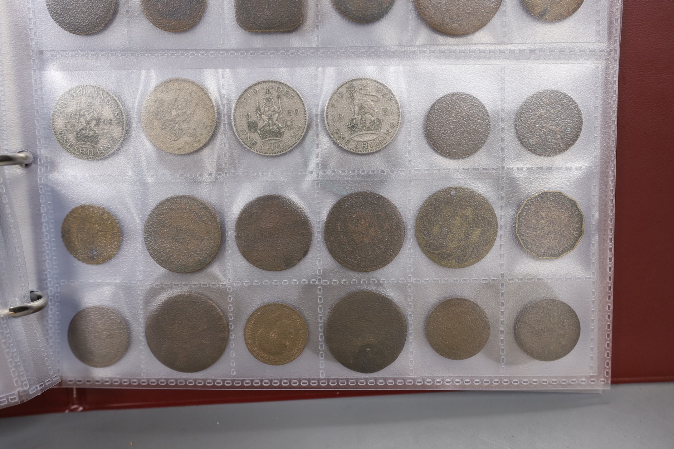 An album of British, Commonwealth and world coins including